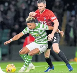  ??  ?? Celtic’s Scott Sinclair holds of Kilmarnock’s Stephen O’Donnell