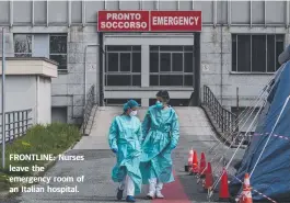  ??  ?? FRONTLINE: Nurses leave the emergency room of an Italian hospital.