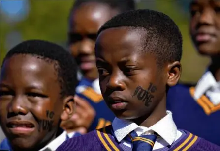  ?? THEMBA HADEBE/AP ?? Children visit the Hector Pieterson Memorial in Soweto, South Africa, on June 16 as the country celebrates Youth Day.