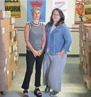  ?? HANNAH SCHROEDER / MILWAUKEE JOURNAL SENTINEL ?? Rebecca Schwartz, left, owner and CEO of 800-CEO-READ, and General Manager Sally Haldorson are changing the name of their bulk bookseller to Porchlight Book Company.