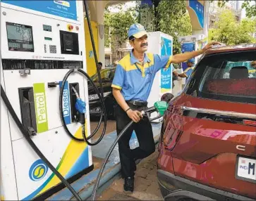  ?? Rajanish Kakade Associated Press ?? INDIA has guzzled nearly 60 million barrels of Russian oil in 2022 so far, compared with 12 million barrels in all of 2021, according to a data firm. Above, an employee of a Bharat gas station fuels up a vehicle in Mumbai.