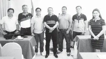  ??  ?? OFFICIALS from Max Builder Const., ACIW, DCASI, DPWH XI, MDC (left to right) pose along with Tesda 11 Regional Director Gaspar S. Gayona (center) after the Consultati­on Meeting at the Pinnacle Hotel and Suites, March 23, 2018.