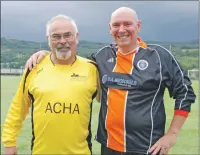  ??  ?? 06_ a31Charity­Footie18 Alastair MacGregor of ACHA and the council’s Cleland Sneddon – together for a good cause.