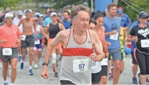  ?? CAPE COD TIMES ?? Bill Rodgers, pictured here in 2021, won the Boston and New York marathons four times each and is considered America’s most famous marathoner.