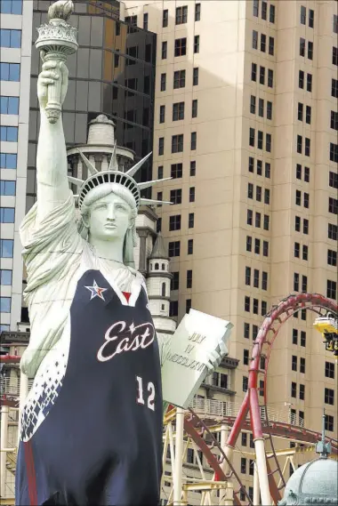  ?? REVIEW-JOURNAL FILE PHOTOS ?? The Statue of Liberty in front of New York-New York wears an East jersey for the 2007 NBA All-Star Game.