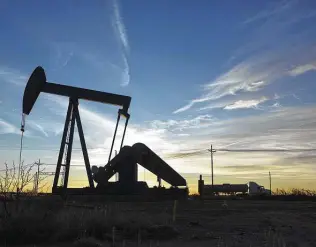  ?? Angus Mordant / Bloomberg ?? Global oil demand will rebound next year as the world emerges from the coronaviru­s pandemic but won’t fully recover until 2022 at the earliest, the Internatio­nal Energy Agency said in June.