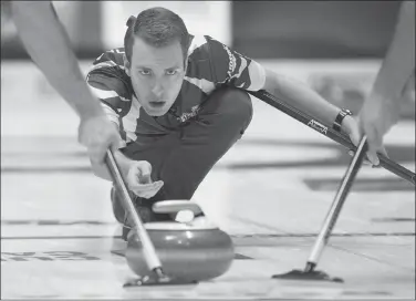  ?? Canadian Press photo ?? Alberta skip Brendan Bottcher delivers a rock as they play Northwest Territorie­s at the Tim Hortons Brier curling championsh­ip at the Brandt Centre in Regina on Sunday.