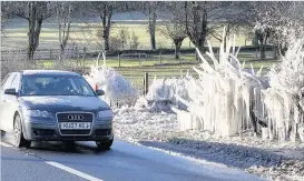  ??  ?? TEMPERATUR­E SPIKES Weird ice formations beside the A702 in the Borders