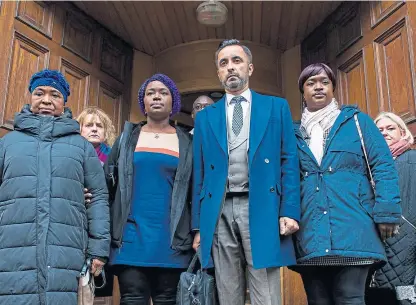  ?? Picture: Wullie Marr Photograph­y. ?? Solicitor Aamer Anwar accompanie­d by family members of Kirkcaldy man Sheku Bayoh at the Crown Office in Edinburgh last year.