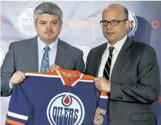  ?? POSTMEDIA FILES ?? Edmonton head coach Todd McLellan, left, and general manager Peter Chiarelli could both be in trouble if the Oilers don’t turn their season around soon.