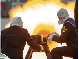  ??  ?? 41 GUN SALUTE Sailors at Portsmouth Naval Base