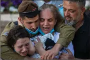  ?? (AP/Ariel Schalit) ?? The mother of Israeli Staff Sgt. Amit Ben-Yigal grieves Tuesday during the soldier’s funeral in Beer Yaakov.