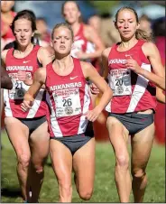  ?? NWA Democrat-Gazette file photo/JASON IVESTER ?? Dominique Scott (26) runs Oct. 24, 2014, ahead of her Arkansas teammates during the Chile Pepper collegiate 8K at Agri Park in Fayettevil­le. The three-time All-American will lead the Arkansas women’s team during the 27th annual Chile Pepper today.