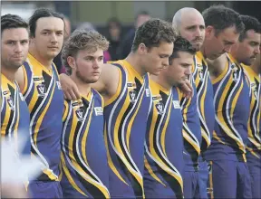  ?? Picture: PAUL CARRACHER ?? SHOW OF STRENGTH: Natimuk United senior footballer­s line up before the inaugural Anzac Memorial Arapiles Cup between Natimuk United and Noradjuha-quantong in 2021.