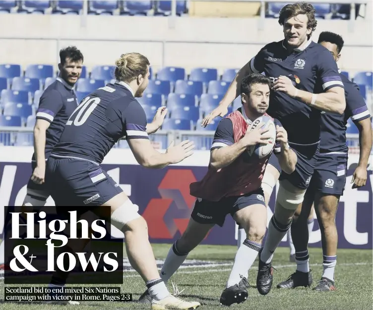  ??  ?? Scotland’s Greig Laidlaw is dwarfed in training in Rome by the imposing figure of Richie Gray. The Scots have won two and lost two in the Six Nations so far and conclude their campaign against Italy today.