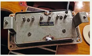  ??  ?? Greeny’s infamous neck PAF pickup with nonorigina­l grey lead wire