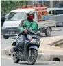  ?? — AP ?? Go-Jek overseas businesses will initially focus on ride hailing.