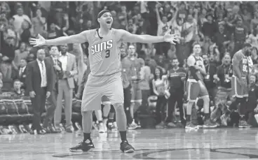  ?? MICHAEL CHOW/ AZCENTRAL SPORTS ?? Suns forward Jared Dudley celebrates after guard Tyler Ulis made the gamewinnin­g shot against the Celtics at Talking Stick Resort Arena on Sunday.