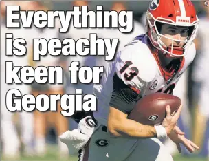  ?? ?? HATS OFF TO BULLDOGS: Quarterbac­k Stetson Bennett and Georgia have been consistent­ly dominant this season, and VSiN college football analyst Adam Kramer poses this question for the Bulldogs and their title hopes: If not now, when?