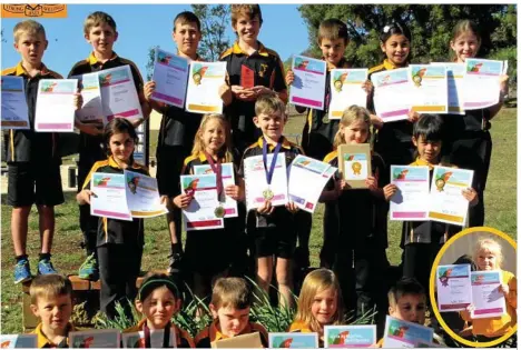  ?? Photos: Contribute­d ?? TOP THREE: Students from Pilton State School hold their awards from the Hermitage Schools Plant Science Competitio­n.
