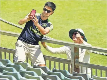  ?? GETTY ?? Mason Crane of England poses for a selfie with a spectator at a tour match against Western Australia XI at WACA on November 5.