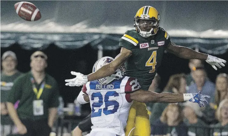  ?? GREG SOUTHAM ?? Montreal Alouettes Tyree Hollins may have got in the way Edmonton Eskimos Adarius Bowman on this play during CFL action Friday in Edmonton. But Bowman, a 10-year CFL veteran, had over 100 yards receiving, the 35th 100-yard game in his career, as the...