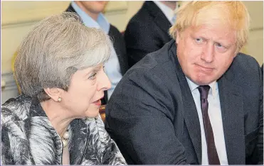  ?? Picture: PA ?? RIFT? But Mrs May insists that she has confidence in Foreign Secretary Boris Johnson