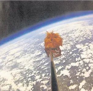  ??  ?? A capsule designed by students at Calthorpe Park School in Fleet, bearing a school banner and stuffed toy mascot, is carried by a helium balloon to the edge of ‘near space’ 32km above the earth.