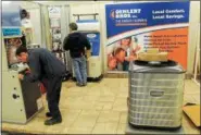  ?? DIGITAL FIRST MEDIA FILE PHOTO ?? The NARI-BIE annual Pottstown Family and Home Expo will be held March 3 and 4 at Coventry Mall. In this file photo, workers put the finishing touches on the Oehlert Bros. Inc. display at the 2016 Pottstown Family and Home expo.