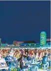  ?? Courtesy of Hite Jinro ?? Seen above are visitors to the Jeonju Gamaek beer festival in Jeonju, North Jeolla Province, on Aug. 8. The festival was sponsored by Hite Jinro’s beer brand Terra.