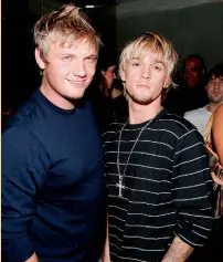  ??  ?? Aaron Carter pictured with brother Nick in happier times