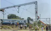  ?? — PTI ?? Rescue and relief works in progress after six coaches and the engine of the New Farakka Express train derailed near Rae Bareli on Wednesday.