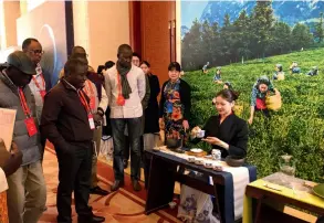  ??  ?? Representa­tives of foreign political parties, who attend a thematic conference on the CPC’S stories in Nanchang, watch traditiona­l Chinese tea making and serving art on November 21, 2019.