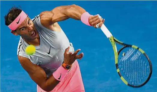  ?? — AFP ?? Back to you: Rafael Nadal returns a shot to Damir Dzumhur during their men’s singles third-round match yesterday.