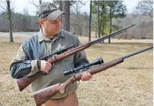  ?? PHOTO CONTRIBUTE­D BY LARRY CASE ?? John Fink displays new and old models of Remington .22 rifles. The .22 has great value as a range weapon for training as well as at home, on the farm and in the field for hunters.