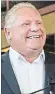  ??  ?? Premier Doug Ford: Vehicle emissions are much improved.