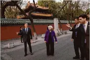  ?? Tatan Syuflana/Associated Press ?? Treasury Secretary Janet Yellen and Ambassador Nicholas Burns visit the Guozijian Imperial College site Monday in Beijing.