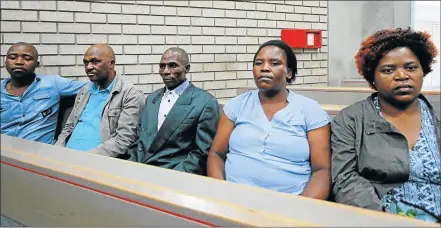  ?? Picture: LULAMILE FENI ?? DEEPLY DISAPPOINT­ED: From left, Sibulele Tyali, NkosI Sithibandl­a Tyali, Masindi Tyali, Saphokazi Tyali and Nozipho Tyali at Mthatha High Court when the case of the murder of their mother was postponed. The case have been in court for the past 10 years...