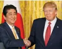  ??  ?? Bond: Shinzo Abe with Trump