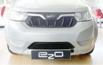  ?? — Reuters ?? Mahindra e2o electric car is pictured inside a Mahindra showroom in Mumbai, India.