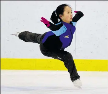  ?? ALLEN MCINNIS/ THE GAZETTE ?? Figure skater Grace Lin, 12, practices at the Dollard Civic Centre Friday. Lin won gold in the pre-novice category at the Skate Canada Challenge competitio­n in Regina last month. The town council is honouring her achievemen­t.