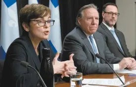  ?? KAROLINE BOUCHER LA PRESSE CANADIENNE ?? La ministre de l’Immigratio­n, Christine Fréchette, le premier ministre, François Legault, et le ministre de la Langue française, Jean-François Roberge, lors de la présentati­on de nouveaux programmes sur l’immigratio­n, le 25 mai.