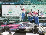  ?? JOHN RAOUX/AP ?? Drivers, from left, Tom Blomqvist, Colin Braun, Helio Castroneve­s and Simon Pagenaud celebrate Sunday after winning the Rolex 24 at Daytona.