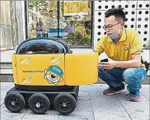  ?? ?? HUMANOS. El robot-delivery va ganando terreno en China.