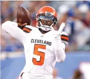  ?? Adam Hunger/ Associated Press ?? ■ Cleveland Browns quarterbac­k Tyrod Taylor (5) throws a pass during the first half of a preseason NFL football game Thursday against the New York Giants in East Rutherford, N.J.