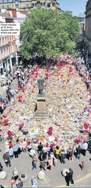  ??  ?? Floral tributes at St Ann’s Square after the bomb last year