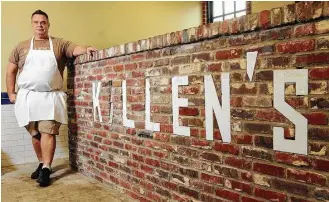  ?? Dave Rossman ?? Ronnie Killen uses a combinatio­n of barrel and rotisserie smokers at Killen’s Barbecue in Pearland.