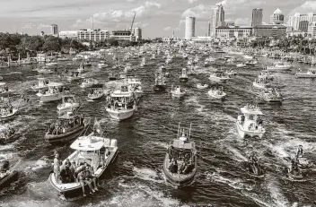  ?? Julio Aguilar / Getty Images ?? In a twist on the typical victory parade and in an appropriat­e style for a team known as the Bucccaneer­s, the Hillsborou­gh River near downtown Tampa was the site of Wednesday’s Super Bowl celebratio­n.