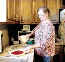  ??  ?? Bernice Headrick, known as the “Pie Lady” in Prairie Grove, gave away her 5,000th pie in February. She usually bakes 12 pies at a time and gives them all away or donates her pies to be used in fundraiser­s.