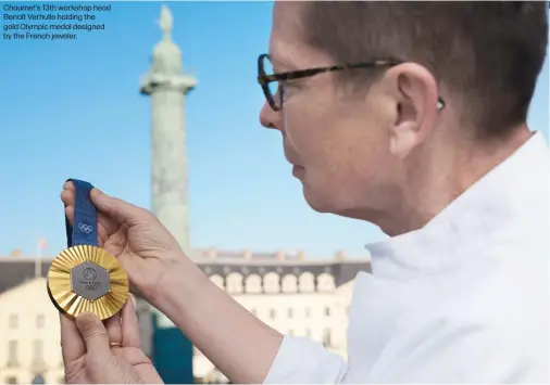  ?? ?? Chaumet's 13th workshop head Benoît Verhulle holding the gold Olympic medal designed by the French jeweler.